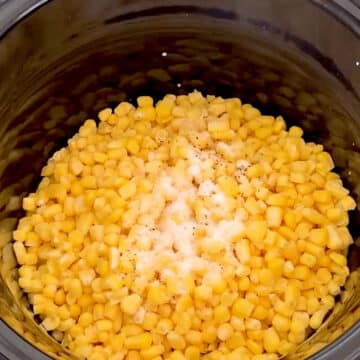 Salt and pepper sprinkled on top of corn. 