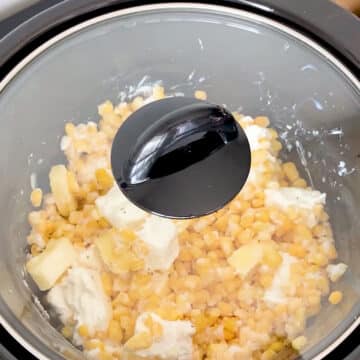 Crockpot with lid cooking. 