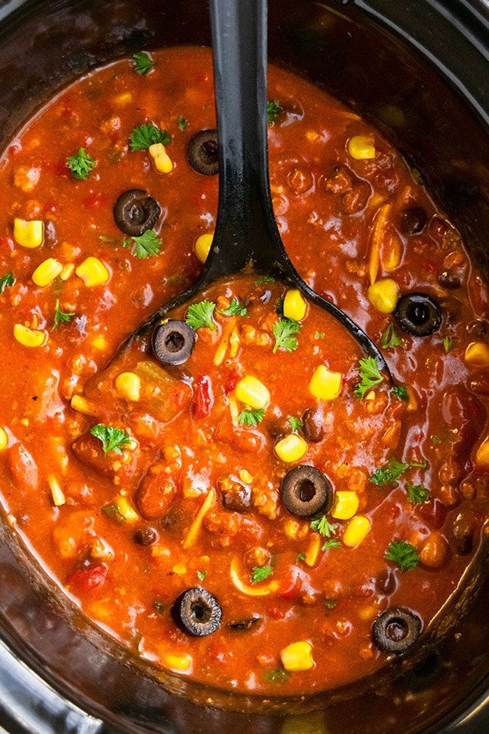 Easy Slow Cooker Chili with a Big Black Spoon