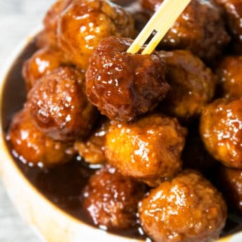 Easy Slow Cooker Grape Jelly Meatballs in White Bowl