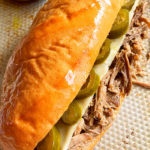 Easy Homemade French Dip Sandwich with Bowl of Au Jus on Silver Tray