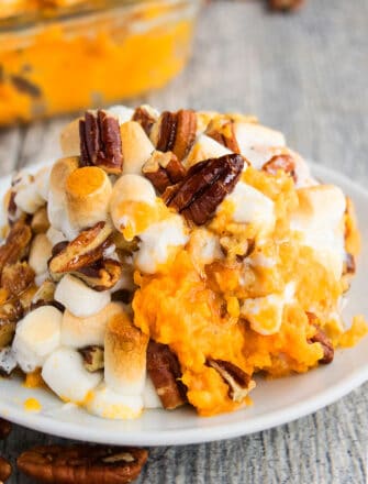 Easy Homemade Sweet Potato Casserole Prepared in Crockpot and Served in White Plate