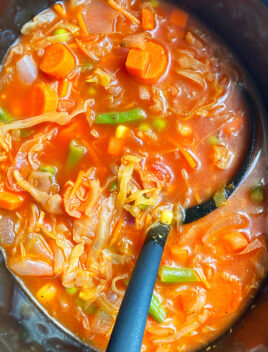 Easy Homemade Cabbage Soup in Black Slow Cooker- Overhead Shot