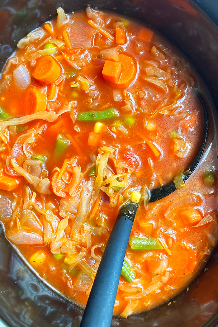 Easy Cabbage Soup in Black Slow Cooker- Overhead Shot