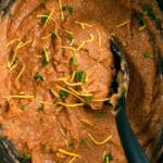 Easy Mexican Homemade Refried Beans in Black Slow Cooker