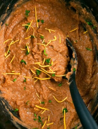 Easy Mexican Homemade Refried Beans in Black Slow Cooker