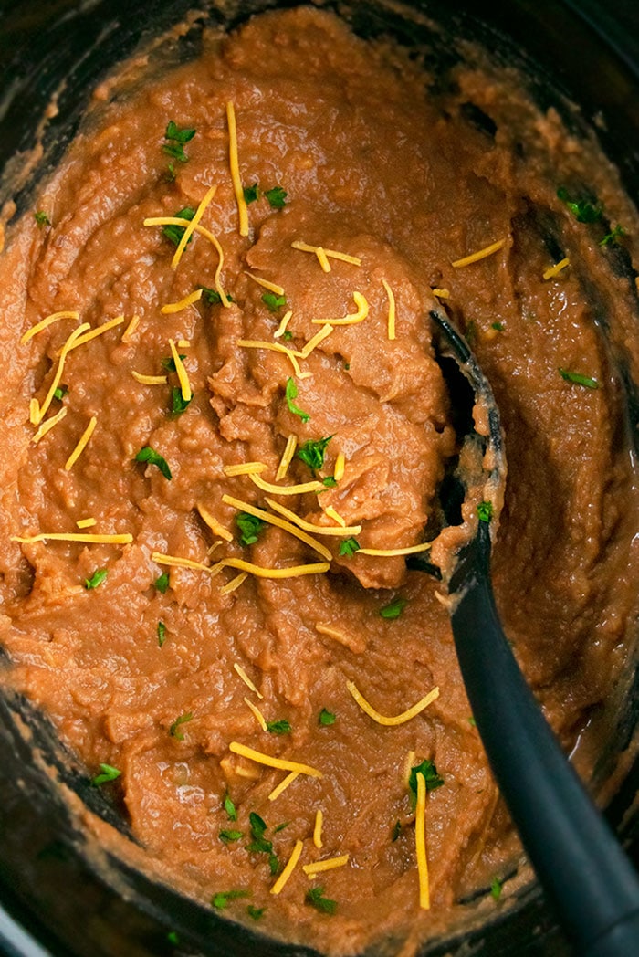 Mexican Homemade Refried Beans in Black Slow Cooker