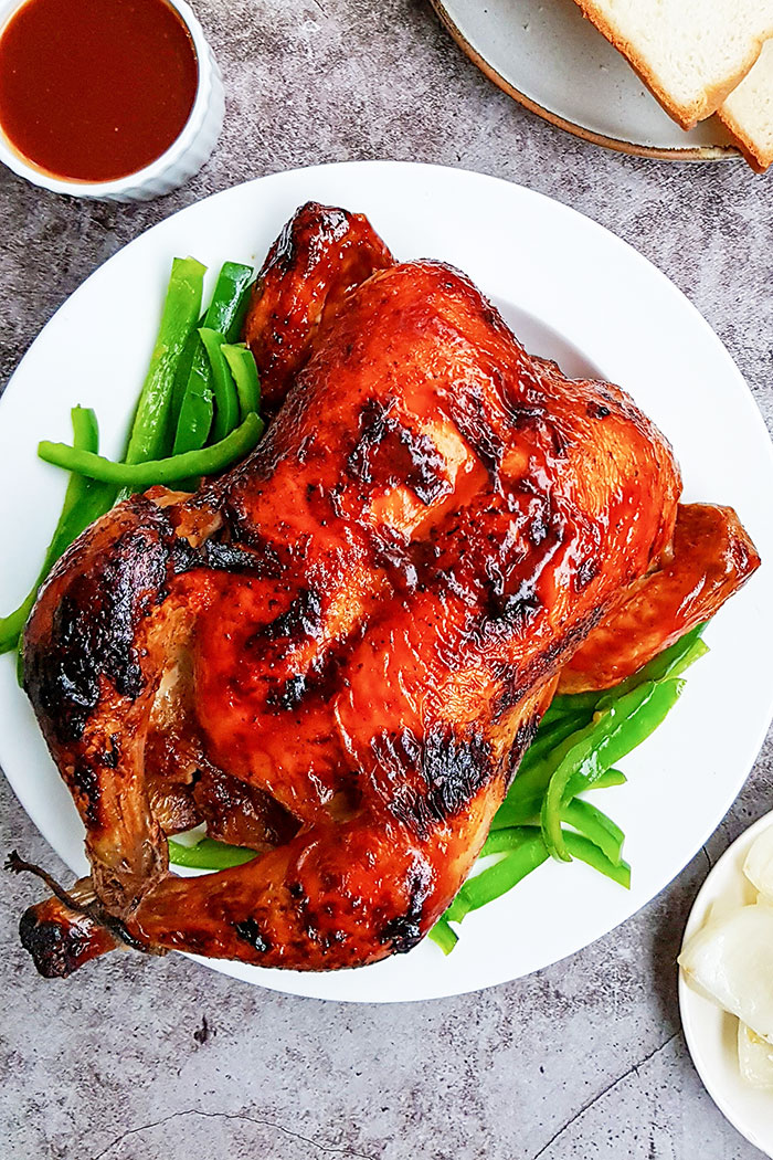 Slow Cooker Tandoori Chicken on White Plate with Gray Background
