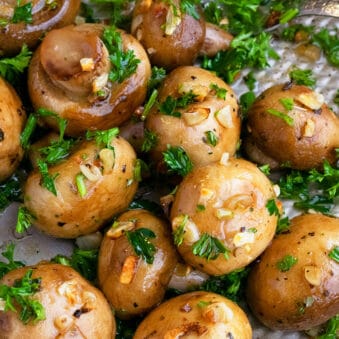 Slow Cooker Butter Garlic Mushrooms Served in Silver Tray