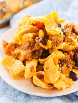 Easy Slow Cooker Frito Pie (Chili Pie) Served in White Dish
