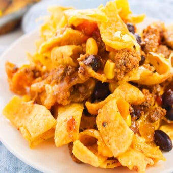 Easy Slow Cooker Frito Pie (Chili Pie) Served in White Dish