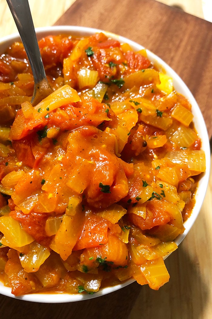 Crockpot Old Fashioned Tomatoes With Onions and Green Peppers in White Bowl