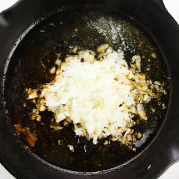 Finely chopped onions added to melted butter and oil in nonstick pan. 